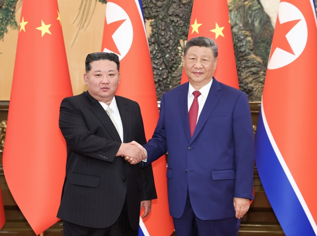 习近平同朝鲜劳动党总书记、国务委员长金正恩举行会谈