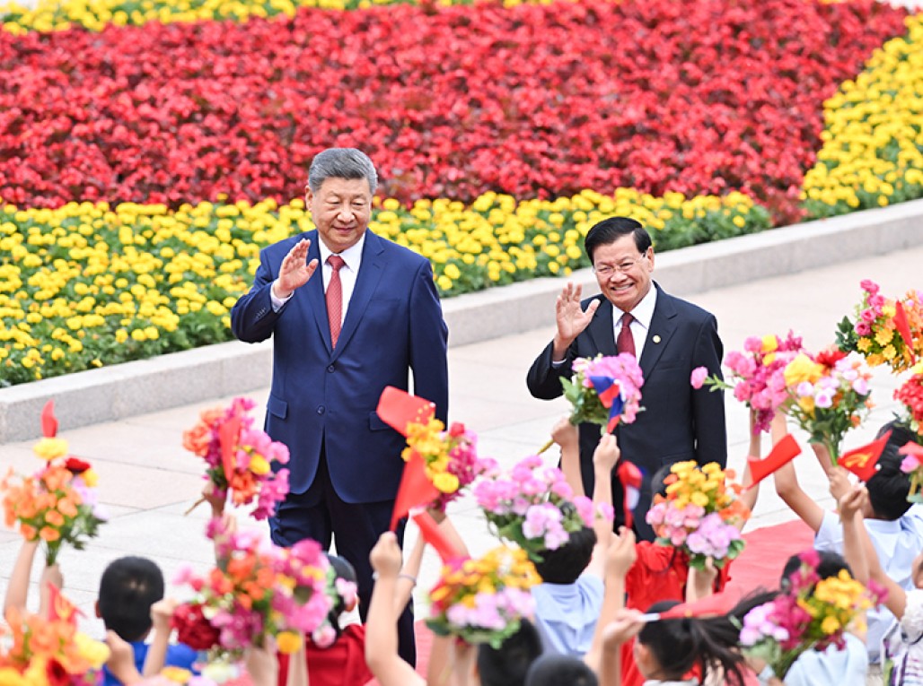 习近平同老挝人民革命党中央总书记、国家主席通伦举行会谈